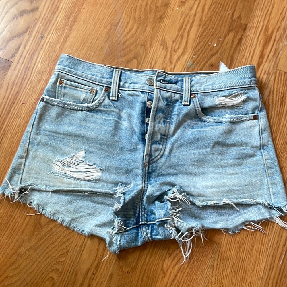 Levi’s light denim distressed cutoffs